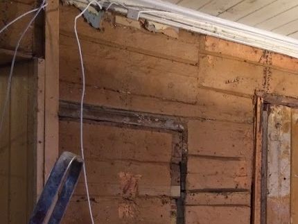 Tømmerveggen fra herskapshuset til Buschfamilien.